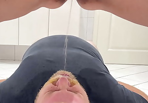 Mistress pissing in his mouth