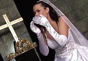 Sexy brunette milf is a bride and she fucks in front of the church altar