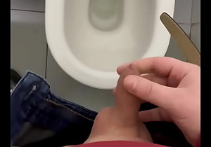 My dick cums in a public toilet close up