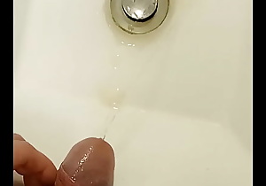 College bathroom: Student clamps his urethra and pisses in the sink and often spits on his cock