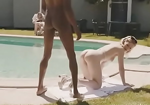 Tina gets fucked poolside by a big black cock