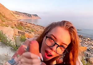 Cute girl with glasses sucks cock while no one is watching