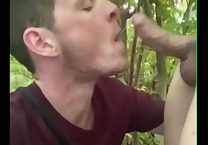 German teen sucking cock in a forest